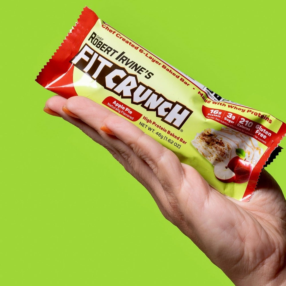 
                  
                    protein bar wrapper in a hand
                  
                